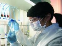 A biotechnology researcher works