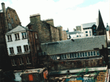 Picture of houses in a city. By Anita Hillestad