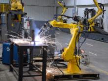 Robotic arm as illustration to Zero Marginal Cost Municipality article